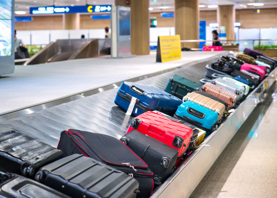 Luggage moving along on a terminal baggage claim